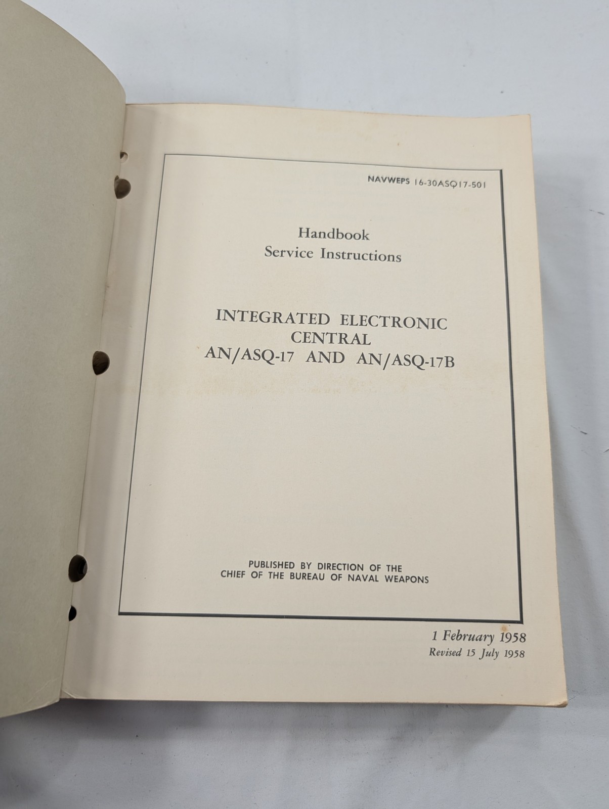 Handbook Service Instructions" for the Integrated Electronic Central AN/ASQ-17