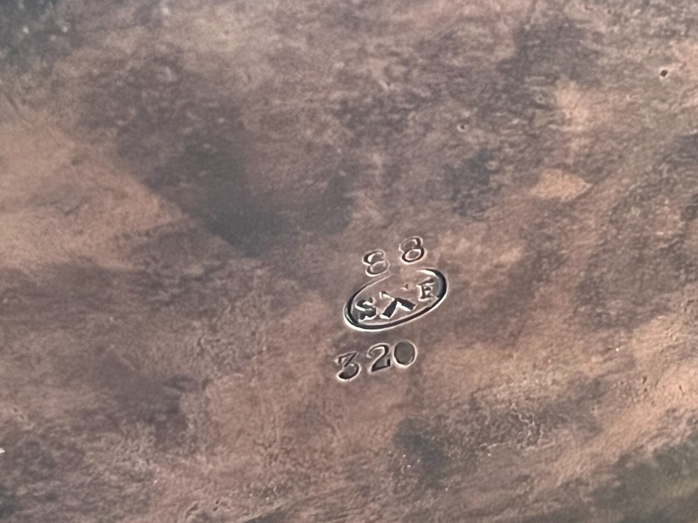 antique tea caddy silver plate .lion with shield on the lid