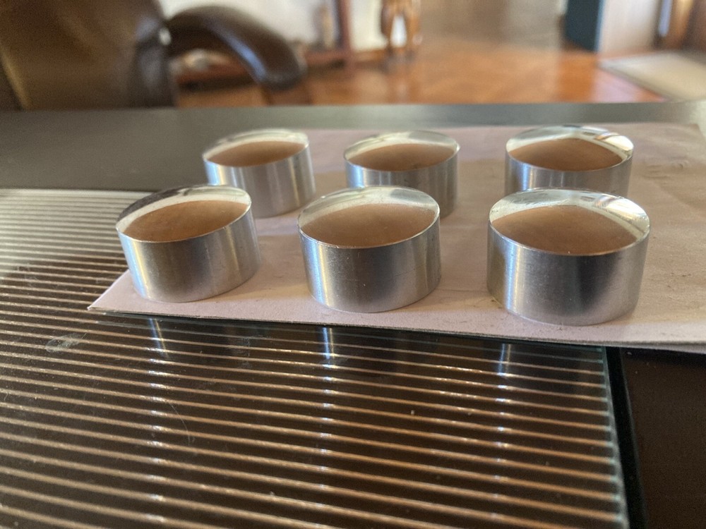Piston pin plugs