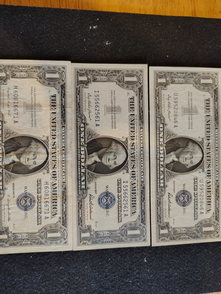 3 1957 blue seal 1 dollar bills