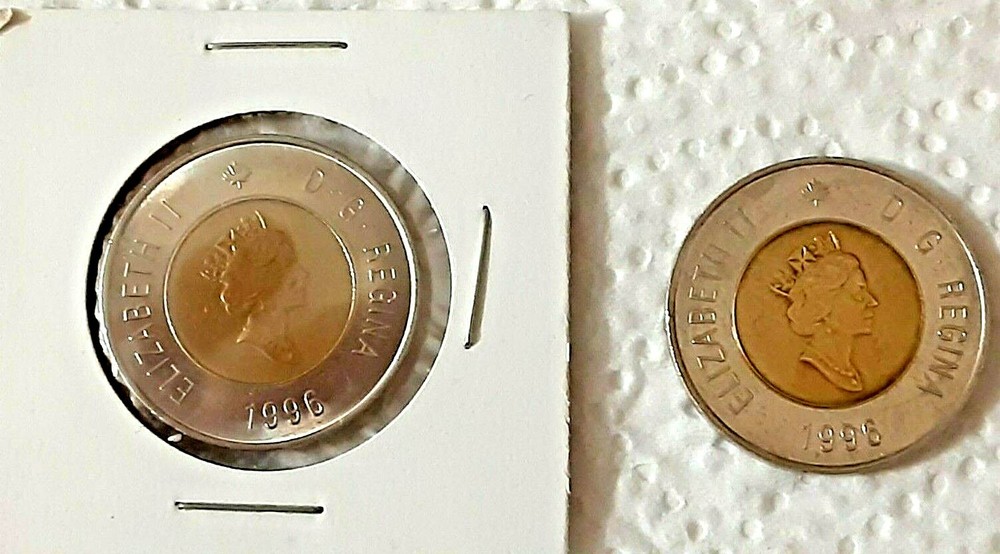 Two $2 Canadian coins