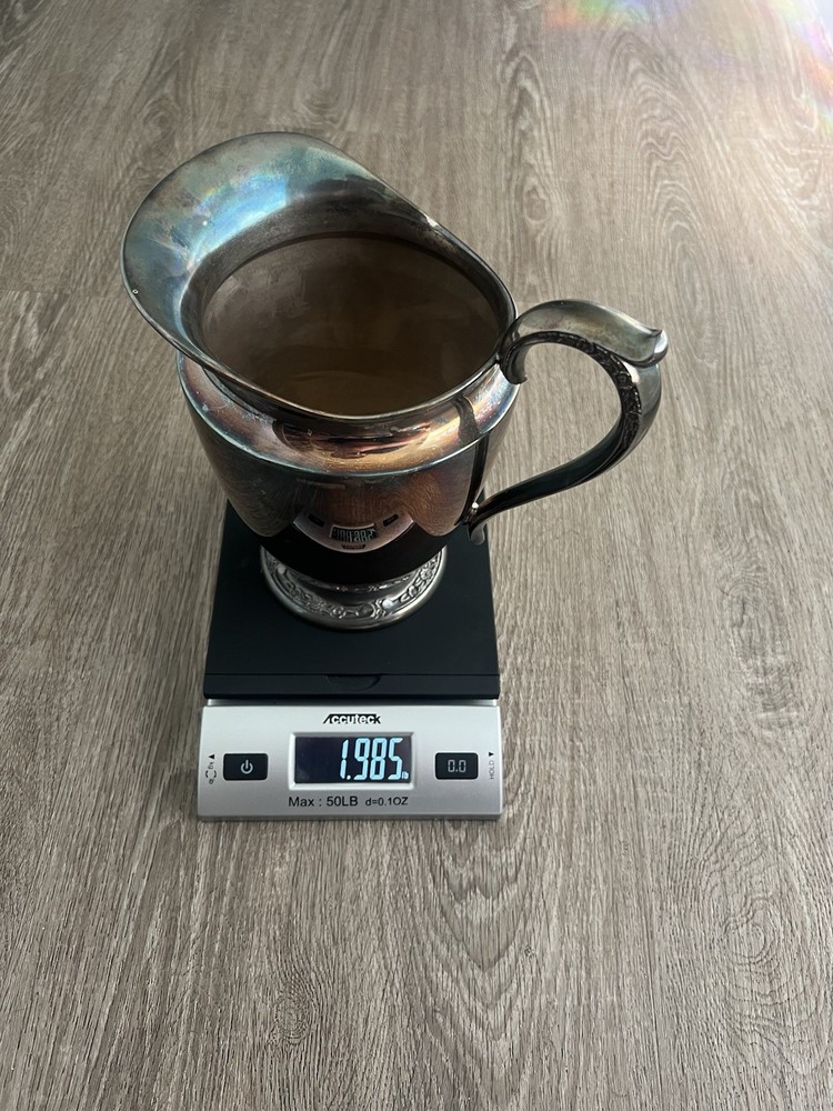 Antique Silver-Plated Decorative Pitcher with Ornate Floral Base Silverplate