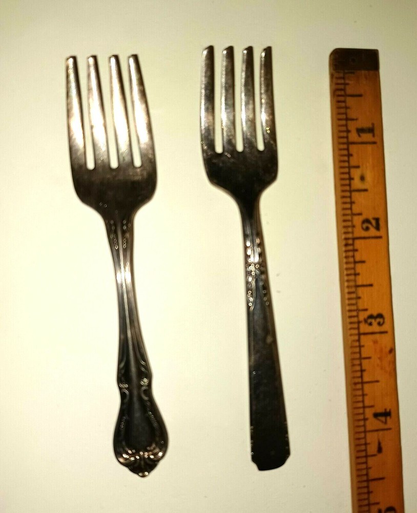 Pair miniature forks not matching 4" tarnished
