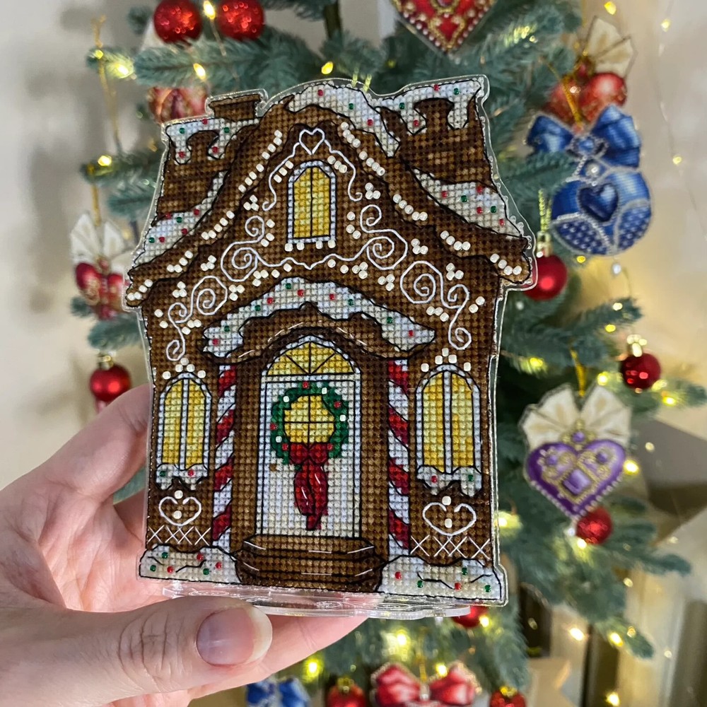 Embroidery kit with threads on a plastic base Gingerbread house decoration