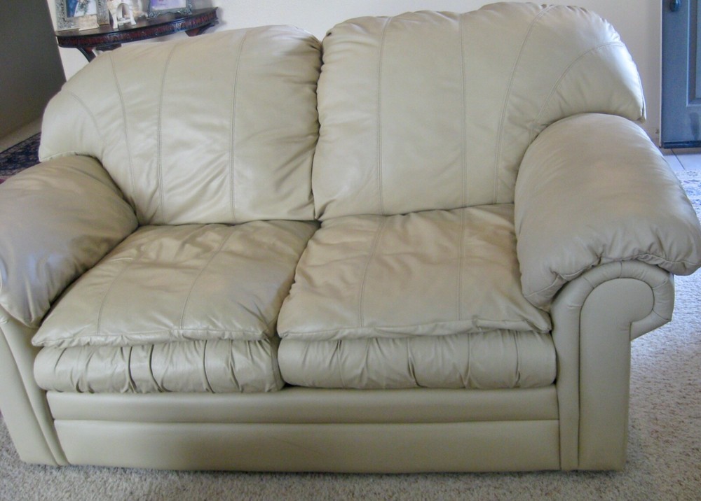 Leather loveseat.  Soft.  Cream color