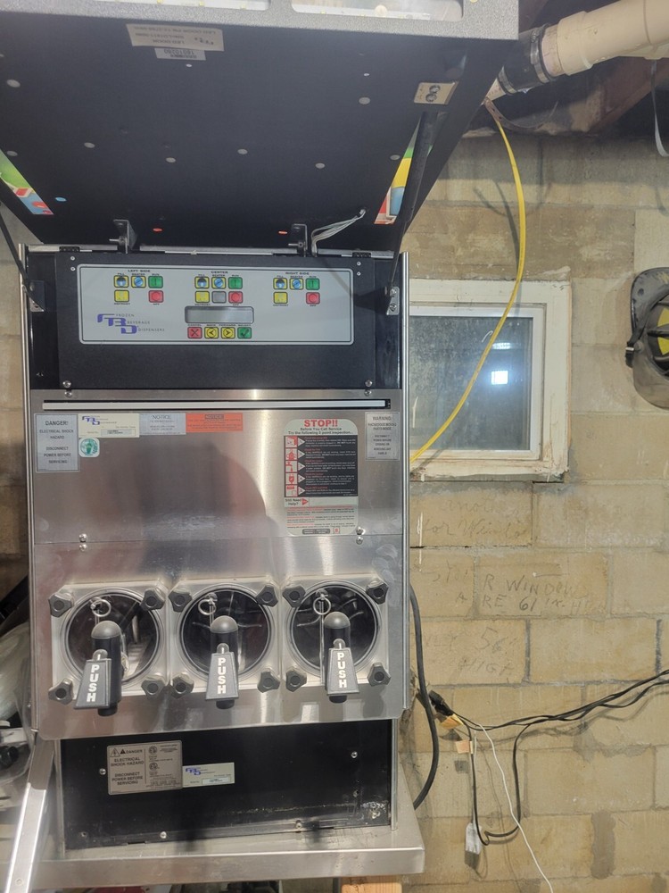 Frozen beverage dispenser (FBD)