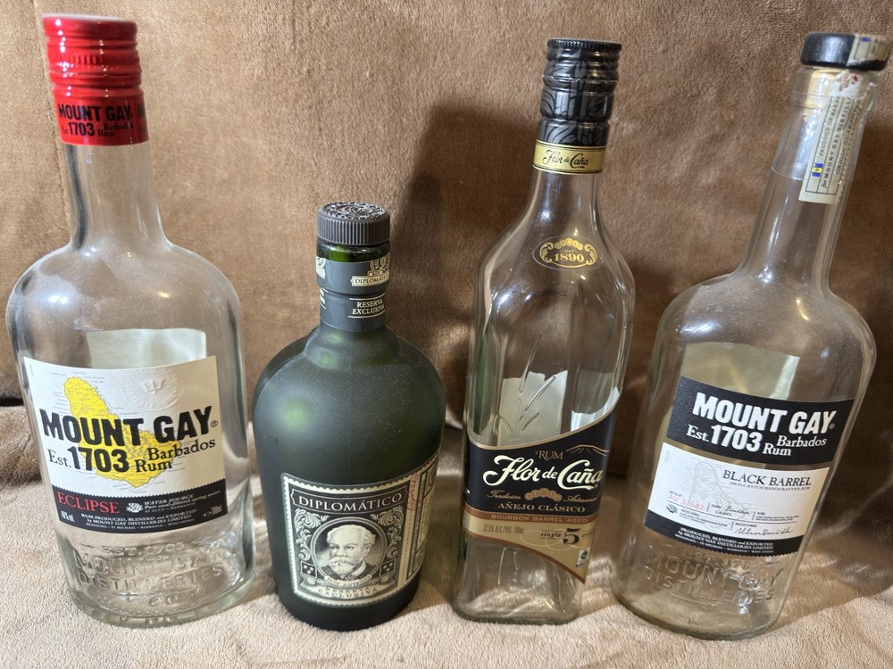 4 EMPTY RUM BOTTLES MIXTURE