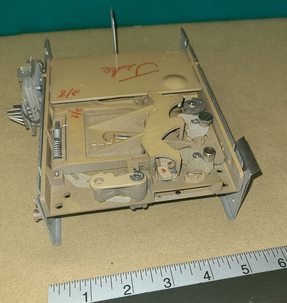 Coinco coin acceptor with jukebox bracket - untested