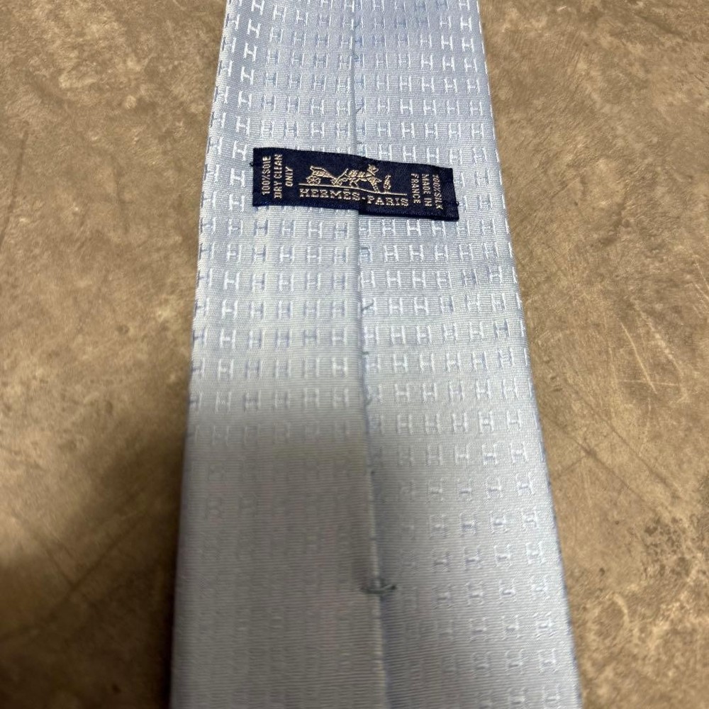 HERMES tie light blue fasone H pattern