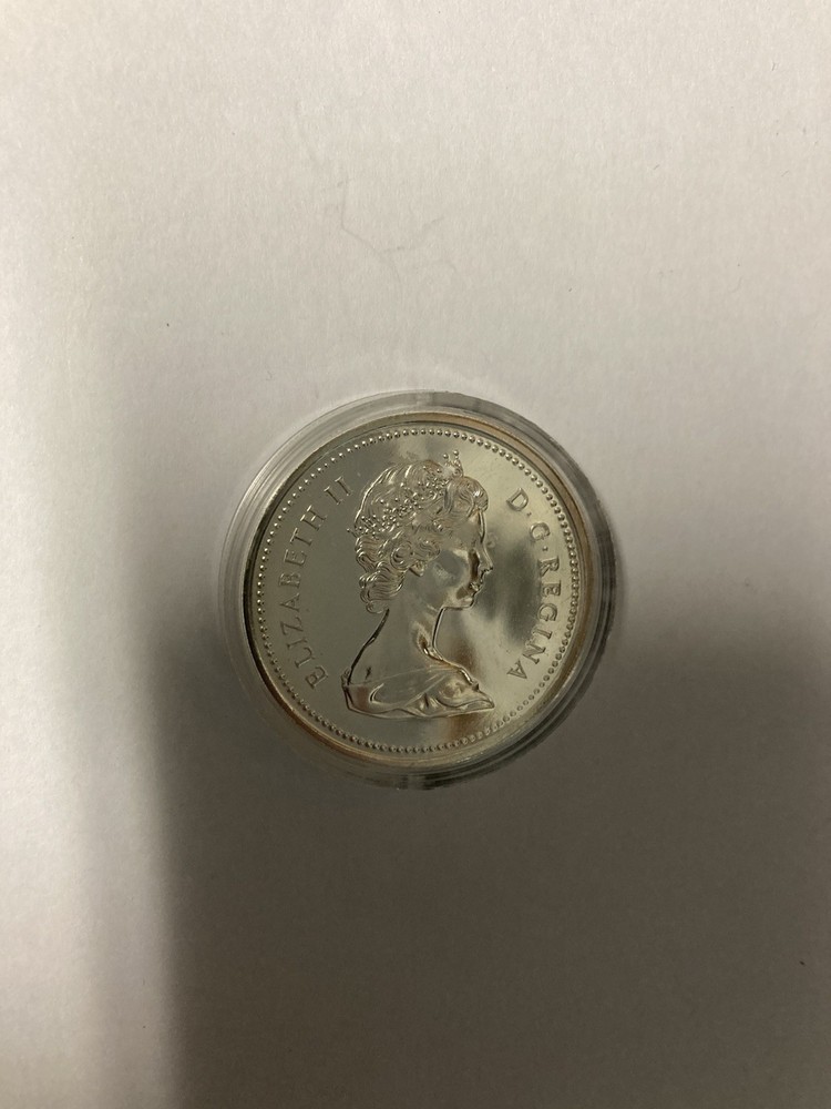 1975 CANADIAN CALGARY SILVER DOLLAR .500