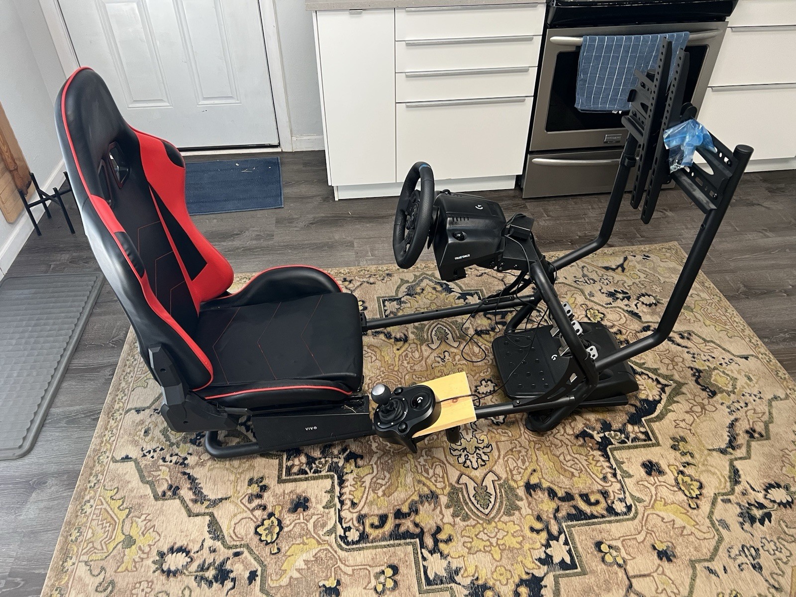 Complete Racing Simulator With Wheel, Pedals, Shifter, Seating Rig With TV Mount