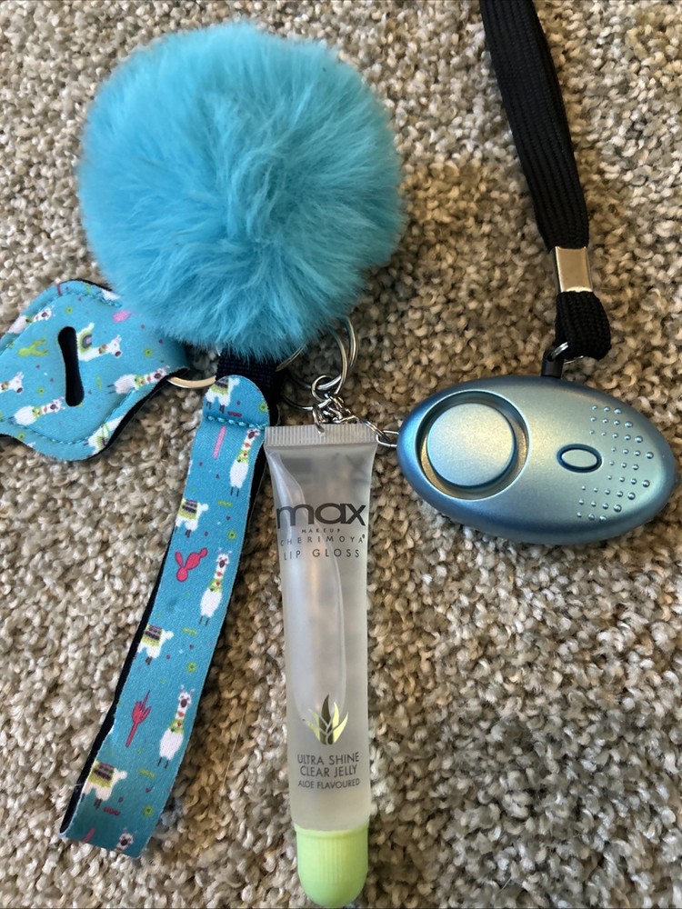 a self-defense keychain set with various accessories.