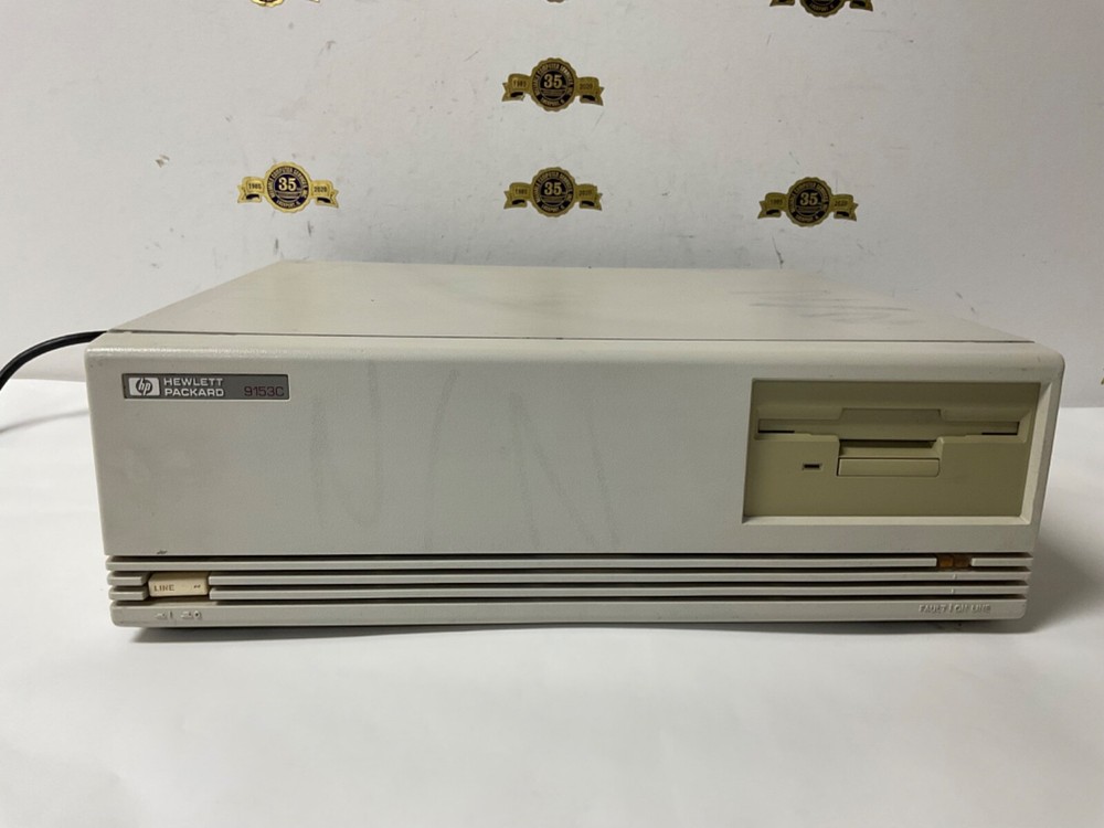 Hewlett Packard 9153C Workstation drive box Floppy Powers up