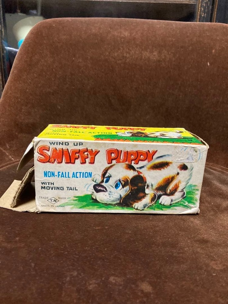 Tin wind-up toy dog