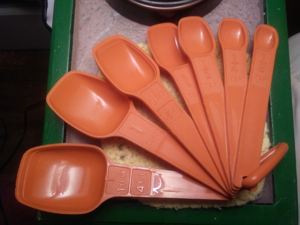vintage Tupperware measuring spoons burnt orange