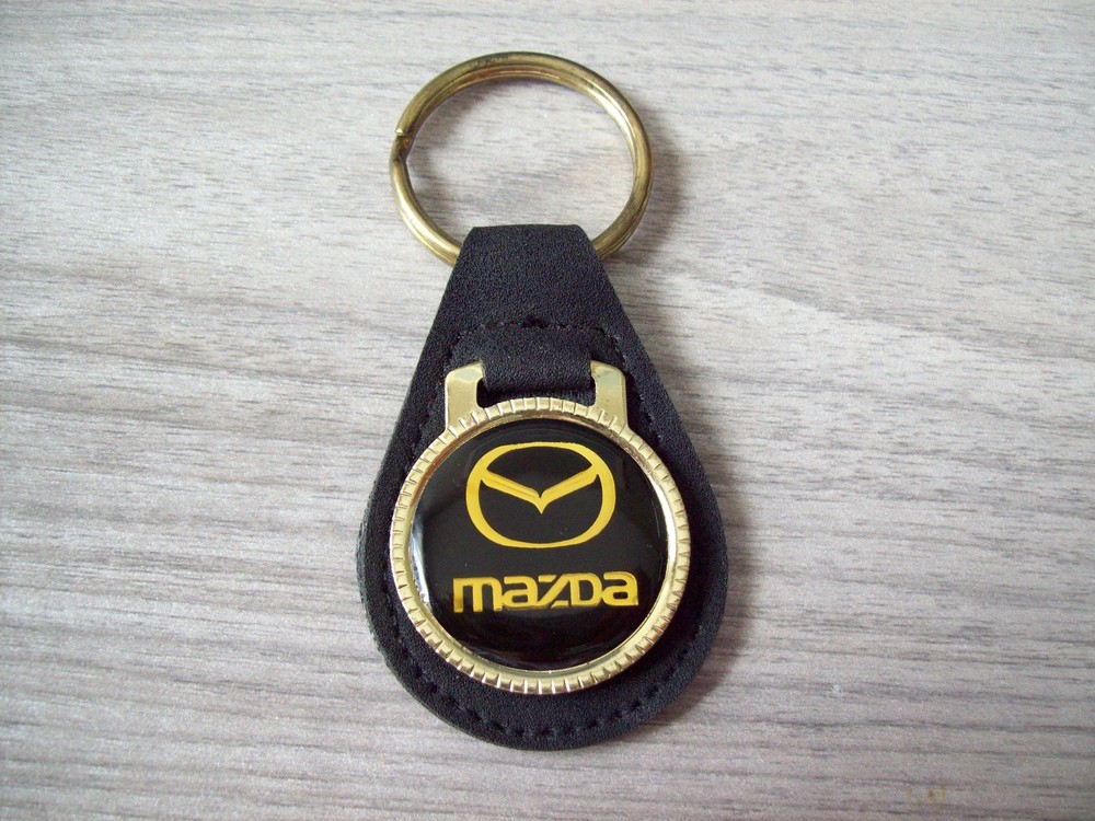 MAZDA  KEY  CHAIN  ........GOLD TONE