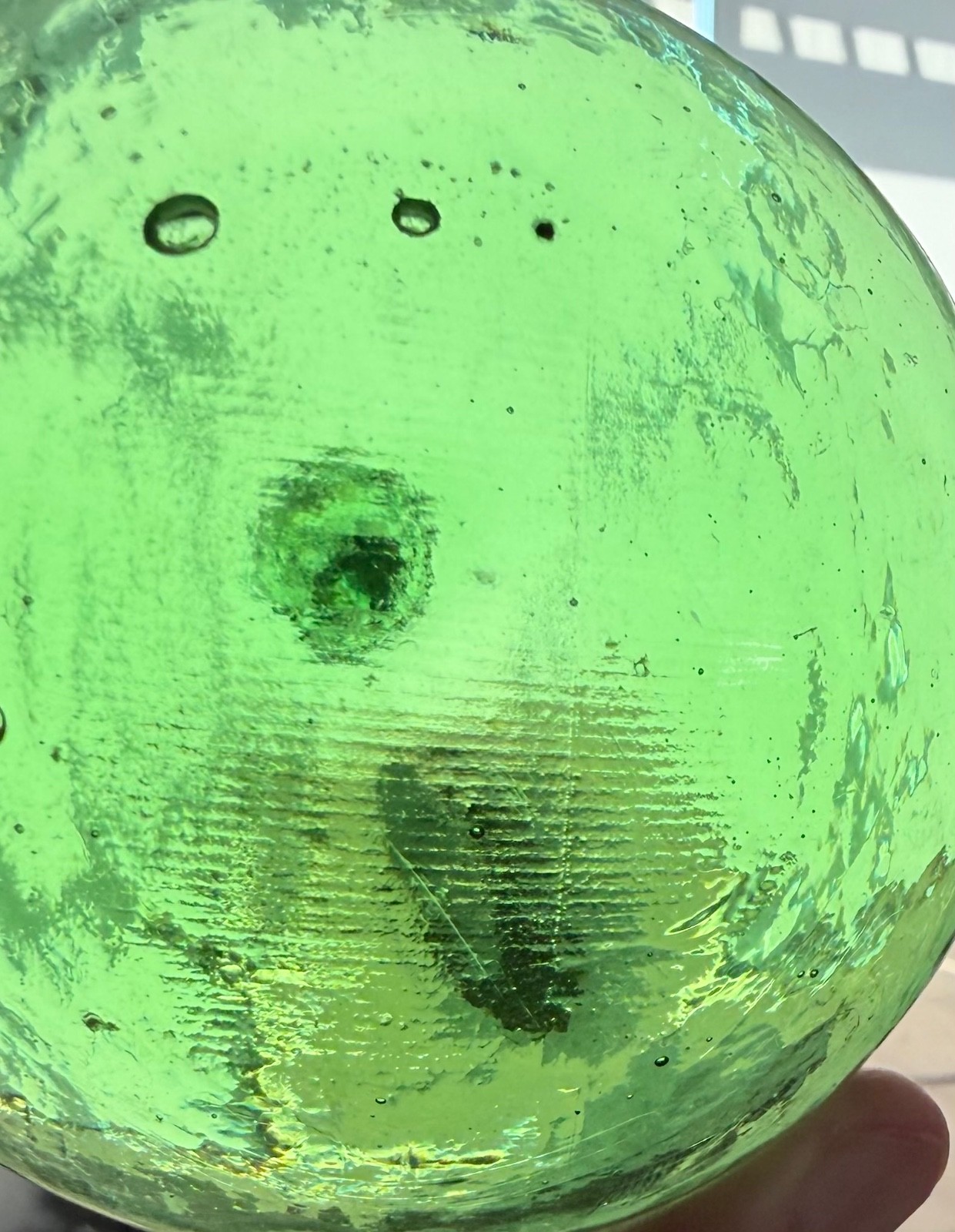 Glass fishing float marked G.P.