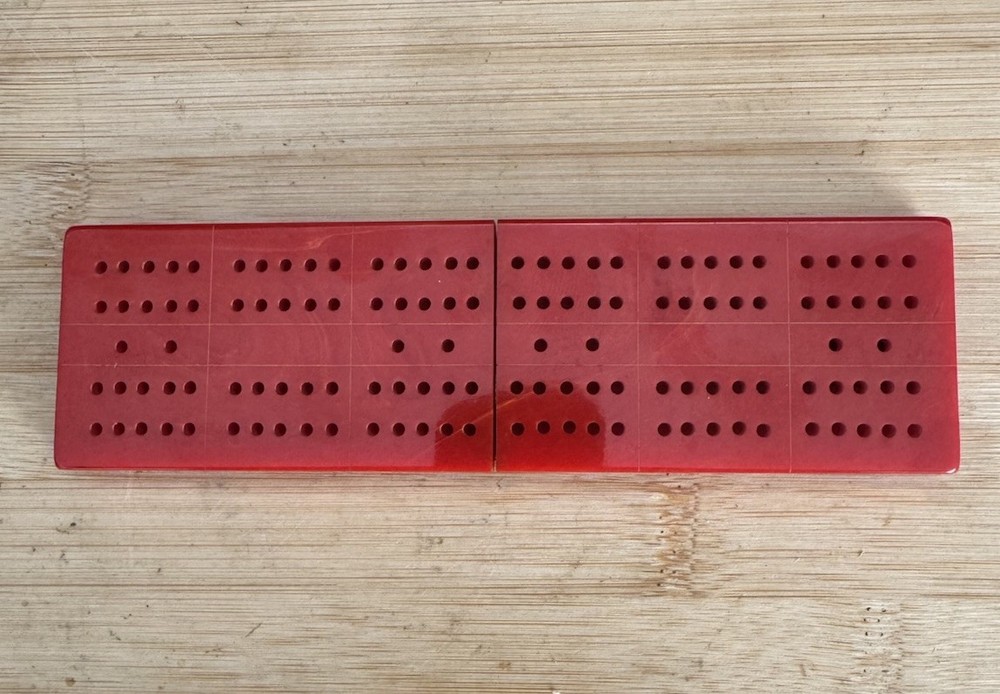 Bakelite Catalin Red Cream Swirl Cribbage Board