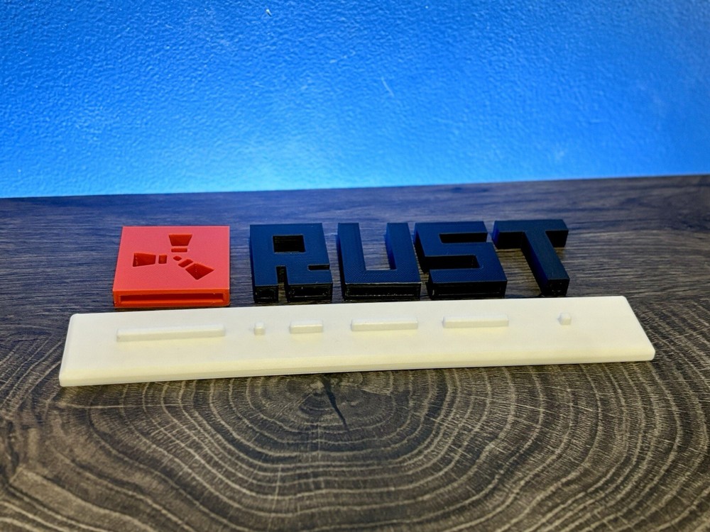 Rust Video Game Stand-Up Sign with Rust Logo, Text, and Base | Rust Prop