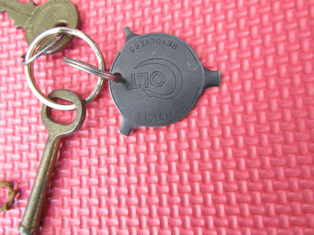 antique key set & colt revolver tool