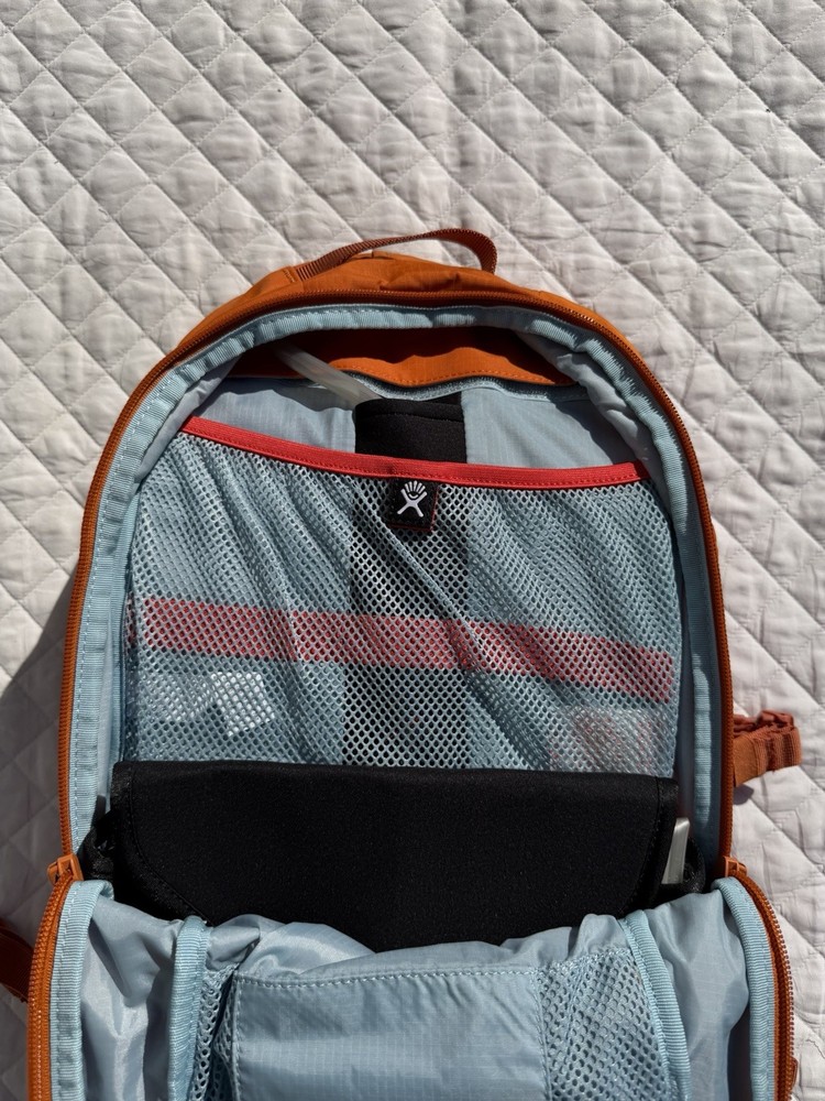Hydro Flask Down Shift Hiking Backpack 14 Liter Hydration Day Pack Bronze Orange