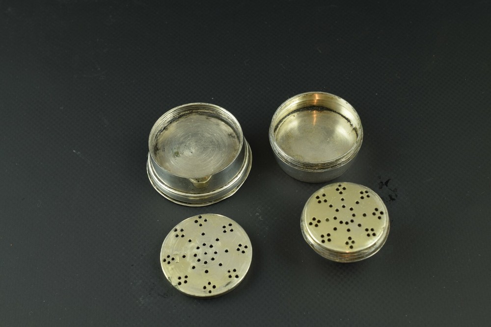 Three-part silver salt shaker or cellar. XIX century.
