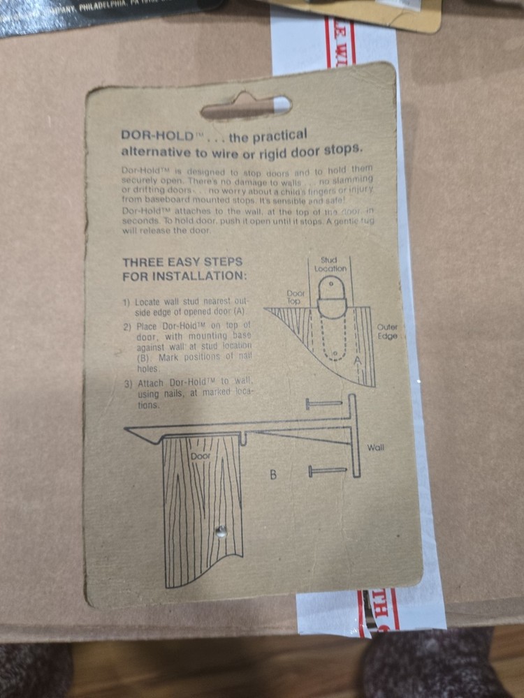 Dor-Hold Stop And Holder