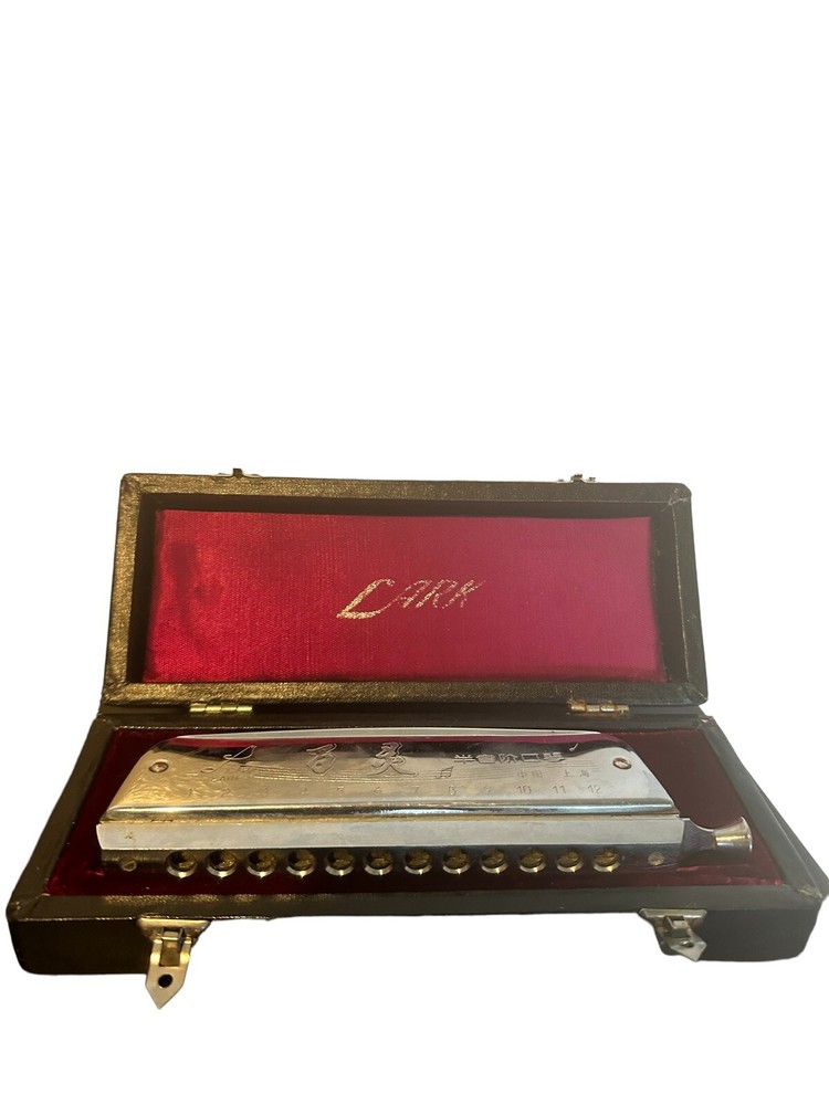 vintage lark harmonica with case