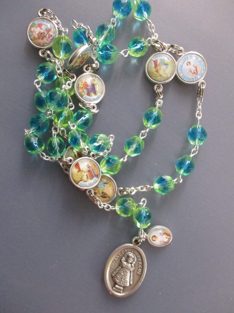 Child Jesus Chaplet (8 mm Blue/Green faceted Czech glass bead with medals)