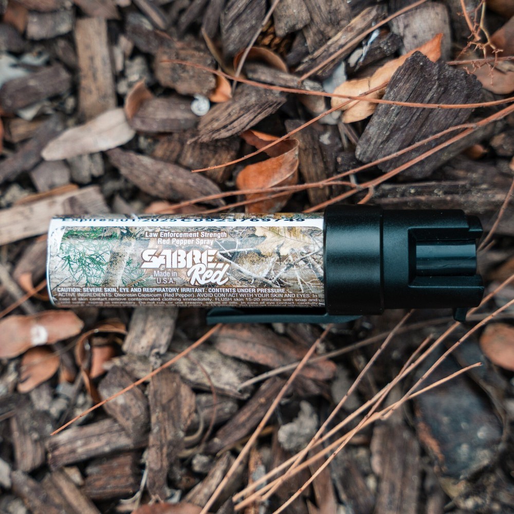 SABRE PEPPER SPRAY WITH ATTACHMENT CLIP CAMO