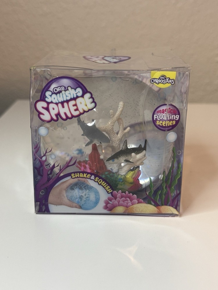 ORB™ Squish-O Sphere Squishy featuring a shark-themed scene inside 🦈