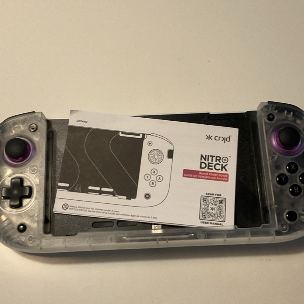 Nintendo Switch & CRKD Nitro Deck Bundle w/ Super Mario Odyssey, Accessories