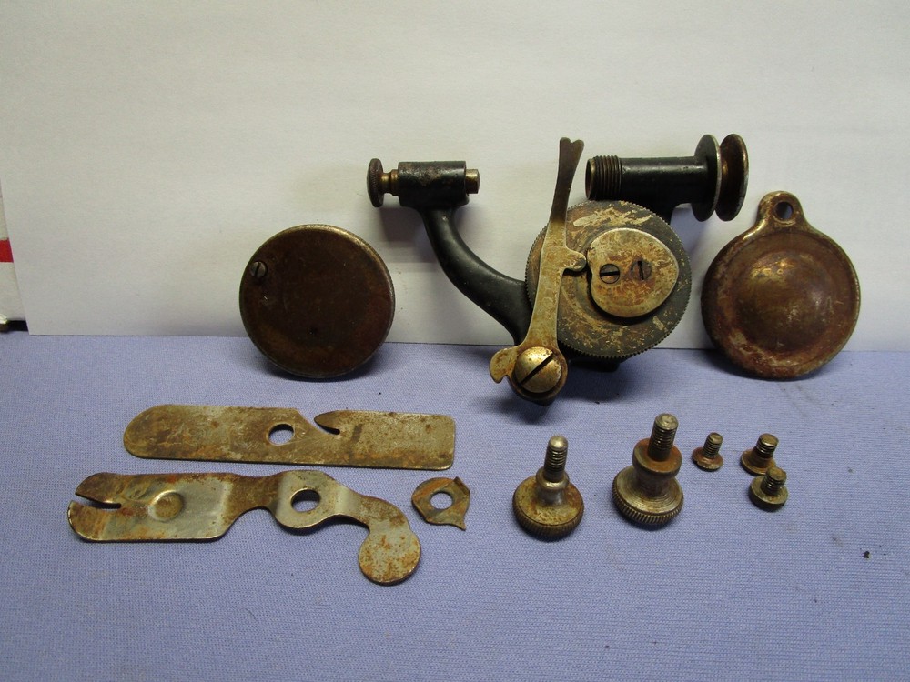 Reliable Sewing Machine Bobbin Winder and misc Thread tension parts.
