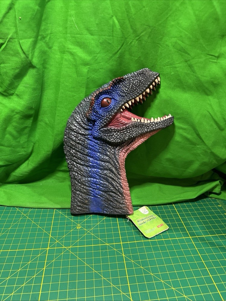 Velociraptor head childrens plastic hand puppet dinosaur