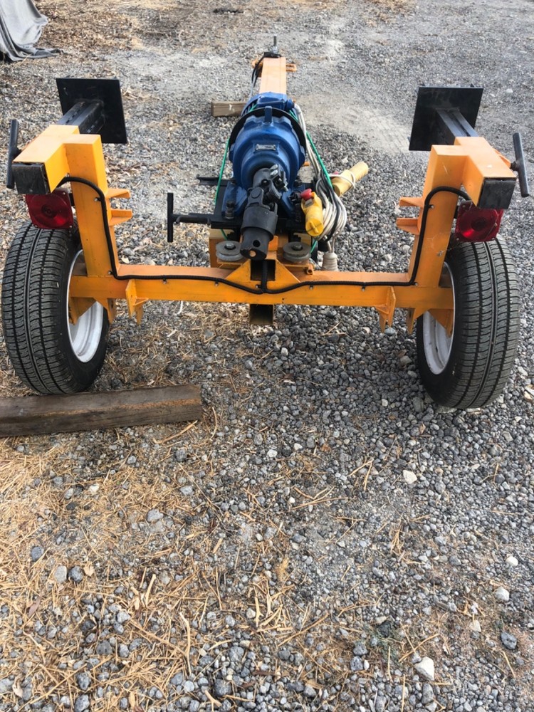 Auger drilling machine built on trailer