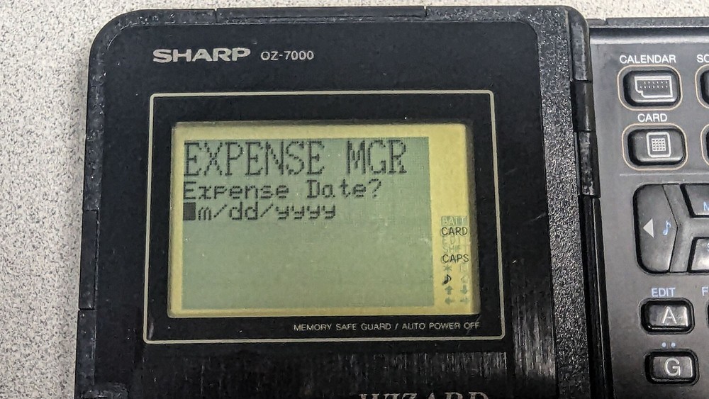 Sharp Wizard OZ-7000 Electronic Organizer with Time & Expense Manager Card