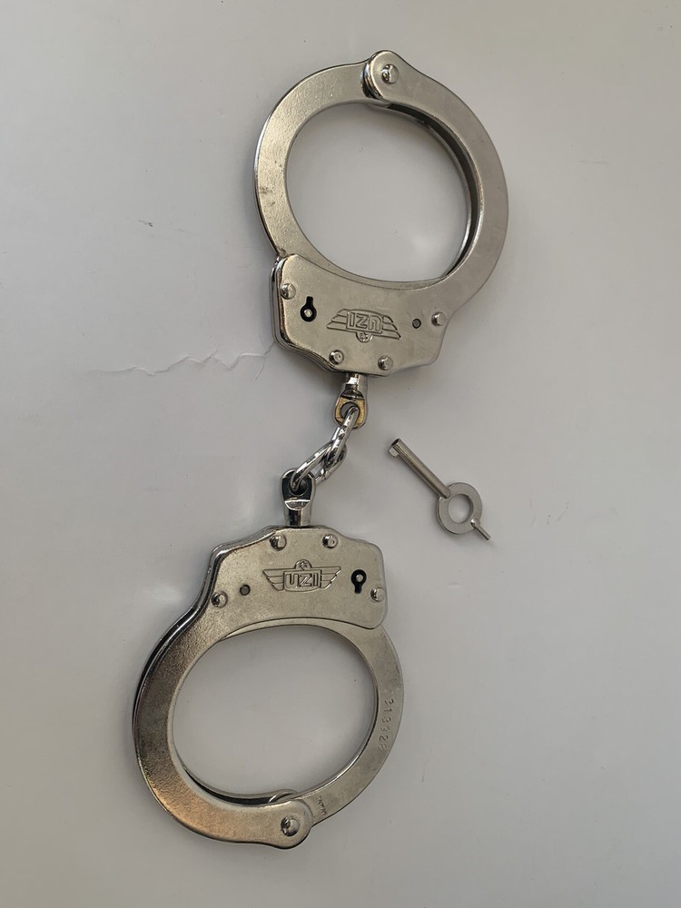 Used UZI Chain Link Handcuffs