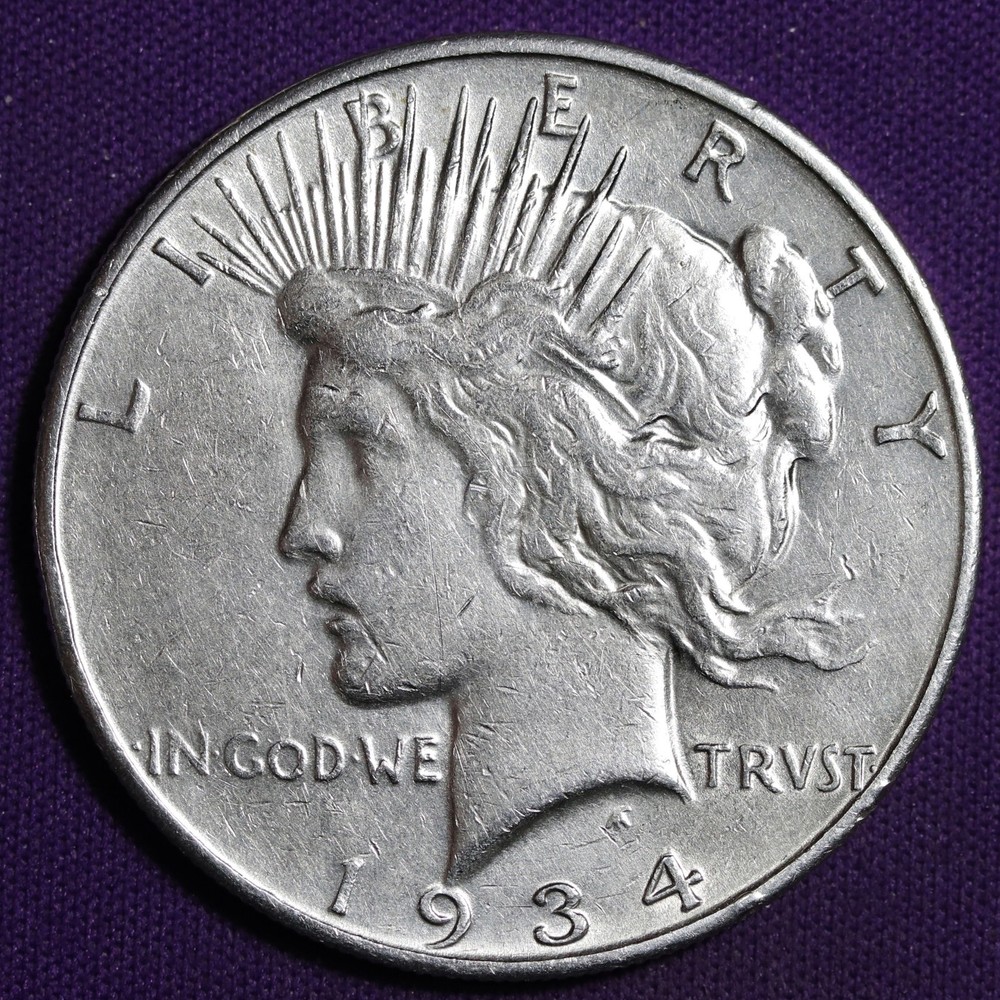 1934-d Peace Silver Dollar.  AU Detail.  211642