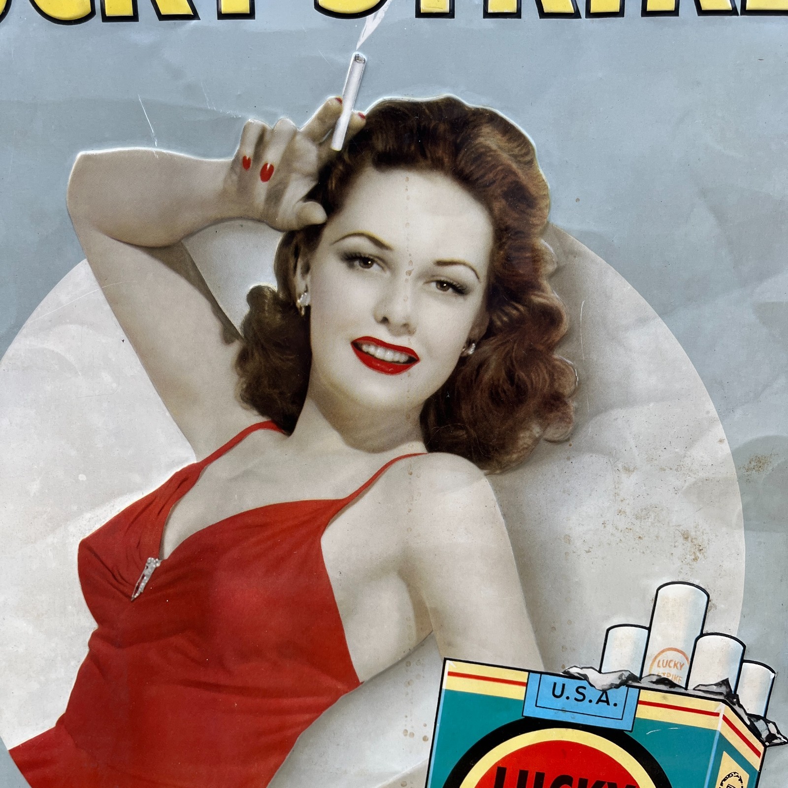 RARE 1940's Lucky Strike Cigarettes Pin Up Embossed Tin Tacker Metal Sign