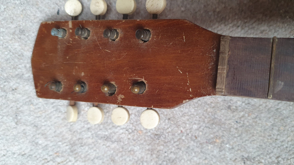 old mandolin, needs repair