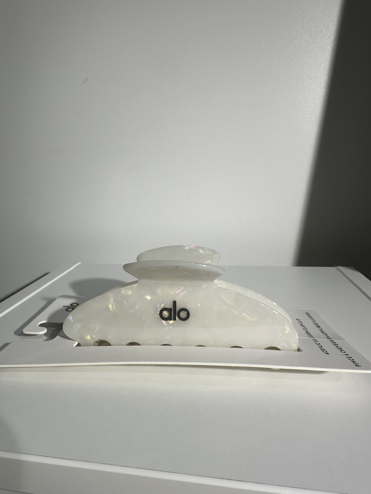 Alo Yoga white acrylic illusion hair clip