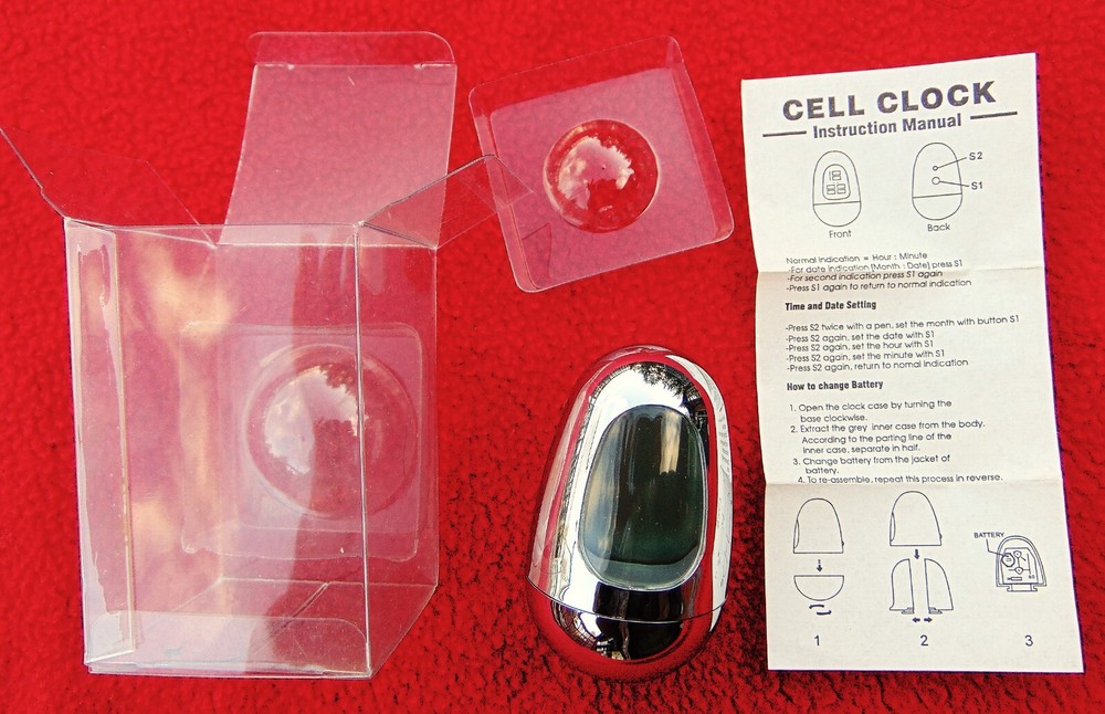 WOBBLE OVAL SILVER EGG CLOCK ~ INCLUDES INSTRUCTIONS ~ 2 3/4" HIGH ~ NEW IN BOX