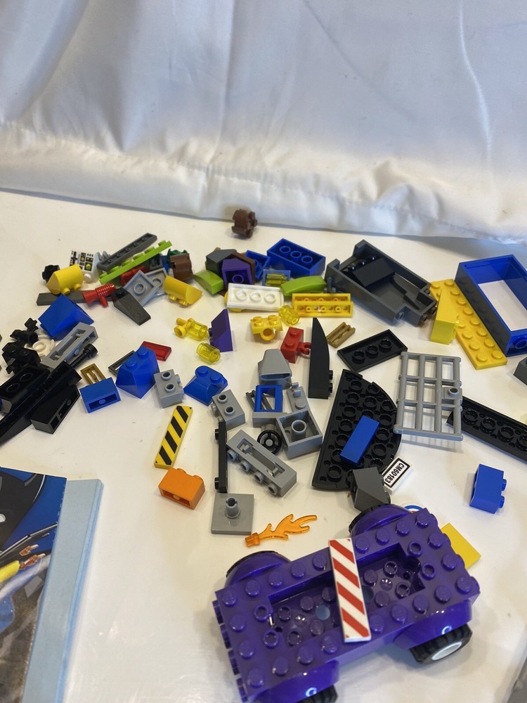 lego blocks and 3 figures with booklet