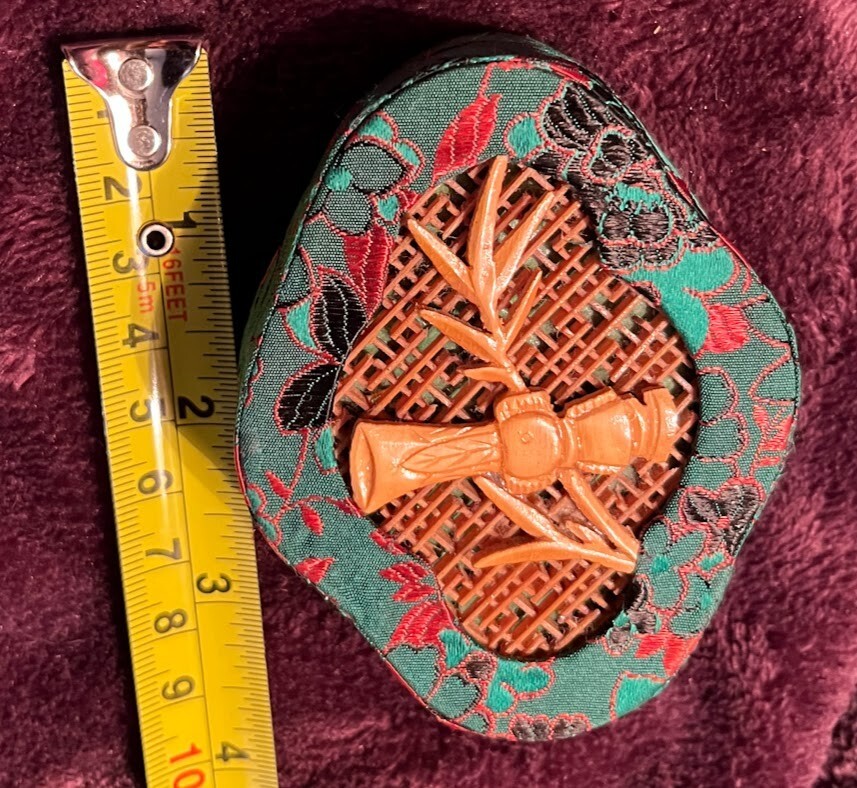 Tiny Box small green satin embroidered with emblem Bake Lite? Celluloid?