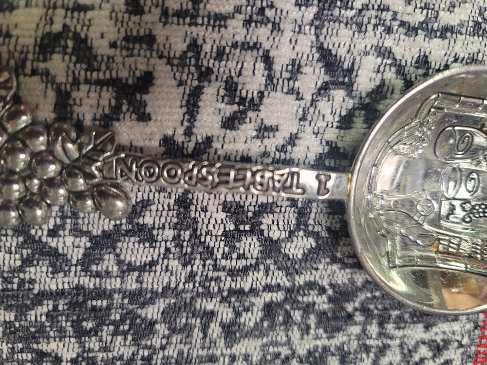 antique measuring cups and spoons