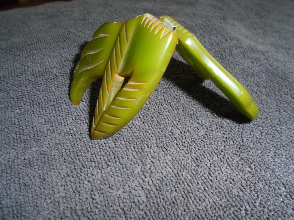 Green carved bakelite buckle