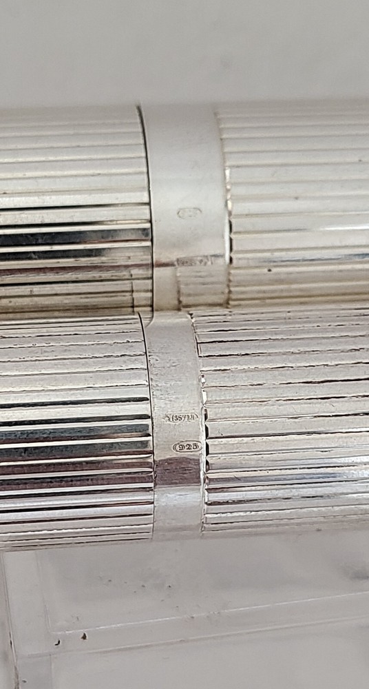 Perfume holder + makeup brush  