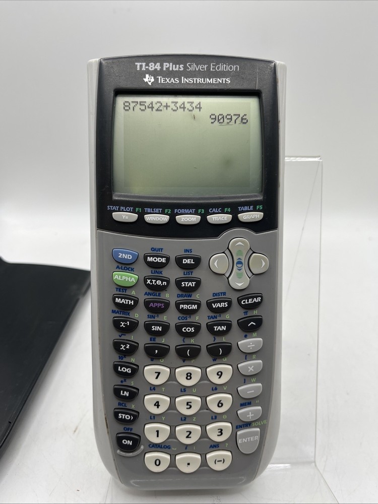 Texas Instruments TI-84 Plus Graphing Calculator - Silver Edition Works