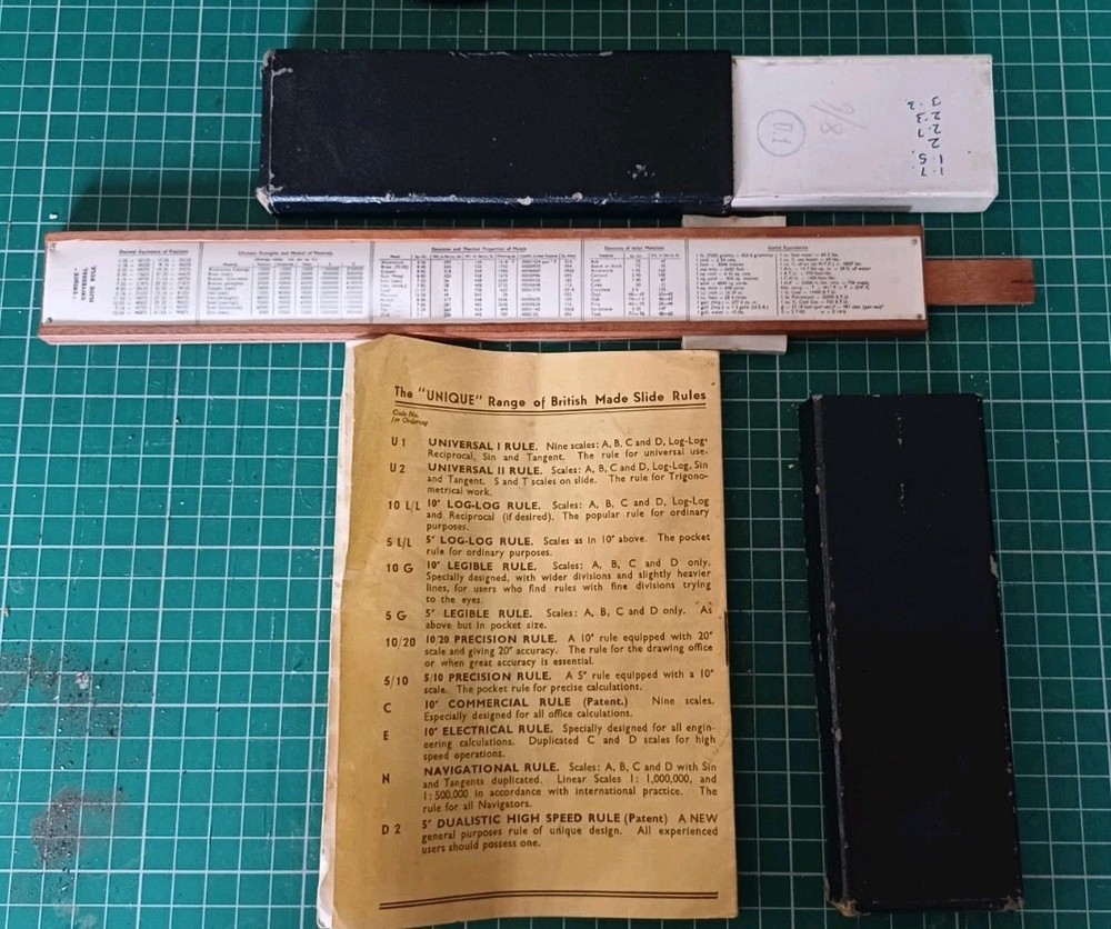 Unique Universal Model 1 Slide Rule. Half-hour instructions. Case UK made.