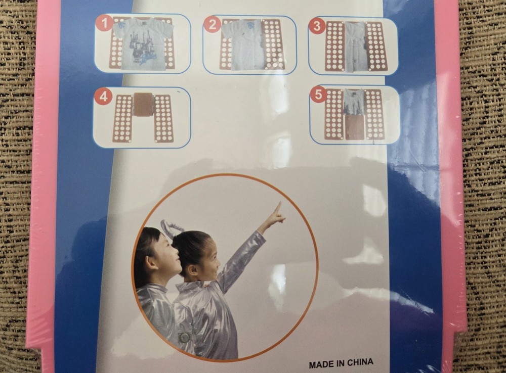 Kids' Foldable Clothing Board